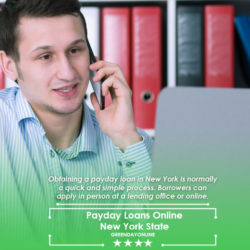 Man at his office in front of his laptop and using his mobile phone